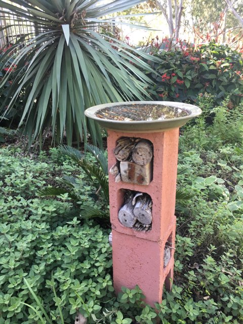recycled besser bricks now an insect hotel and bird bath